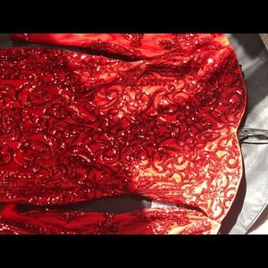 Red sequined prom dress.